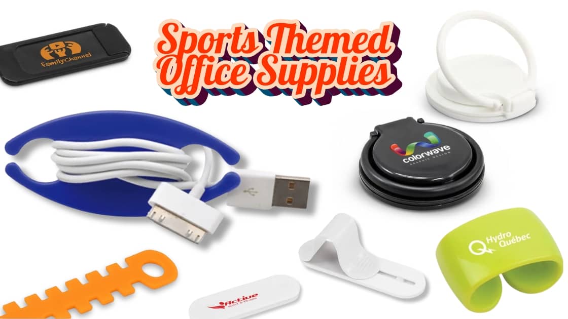 Branded sports-themed office supplies on a desk, including pens, notebooks, and a football-shaped stress ball